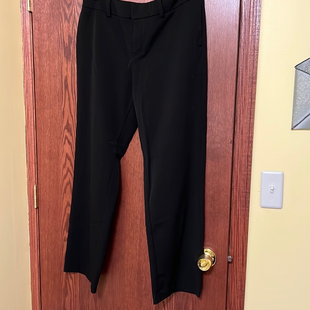 Will be donated 11/01. 
Like new stretch dress pants.